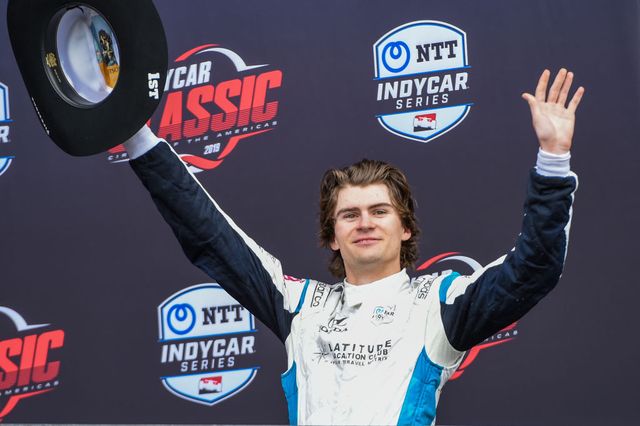 austin, tx   march 24 colton herta 88 of harding steinbrenner racing driving a honda waves to the crowd after being introduced onto the podium for winning the indycar classic  at circuit of the americas on march 24, 2019 in austin, texas photo by ken murrayicon sportswire via getty images