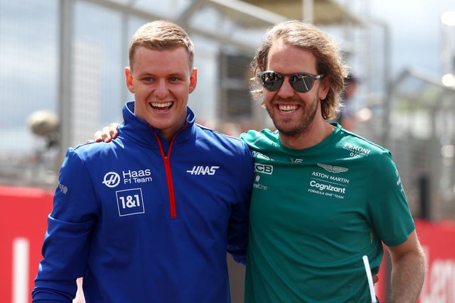 northampton, england   july 03 sebastian vettel of germany and aston martin f1 team and mick schumacher of germany and haas f1 talk on the drivers parade prior to the f1 grand prix of great britain at silverstone on july 03, 2022 in northampton, england photo by joe portlock   formula 1formula 1 via getty images