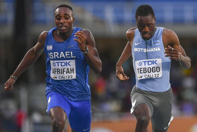israels blessing afrifah l and botswanas letsile tabogo compete in the mens 200m competition during the world athletics under 20 championship in cali, colombia, on august 4, 2022 photo by joaquin sarmiento  afp photo by joaquin sarmientoafp via getty images