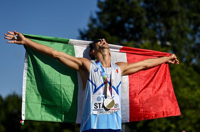 oregon , united states   24 july 2022 massimo stano of italy celebrates  after winning gold in the men's 35km walk final during day ten of the world athletics championships at hayward field in eugene, oregon, usa photo by sam barnessportsfile via getty images