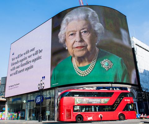 london, england   april 10 an image of queen elizabeth ii and quotes from her broadcast to the nation in relation to the coronavirus epidemic are displayed on screens in piccadilly circus on april 10, 2020 in london, england photo by samir husseinwireimage