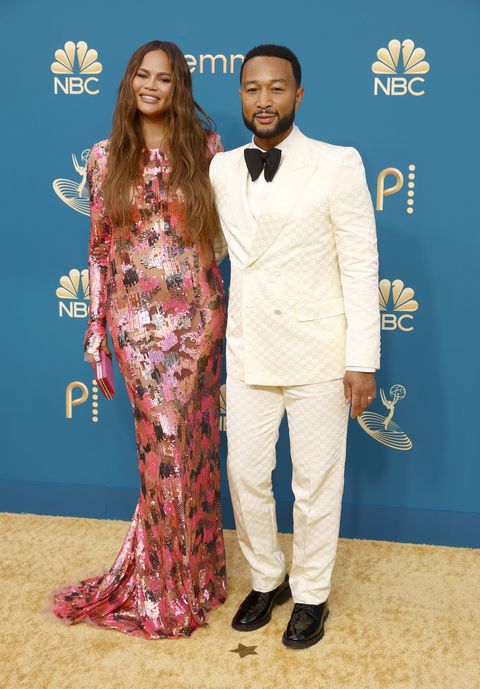 los angeles, california   september 12 74th annual primetime emmy awards    pictured l r chrissy teigen and john legend arrive to the 74th annual primetime emmy awards held at the microsoft theater on september 12, 2022    photo by trae pattonnbc via getty images