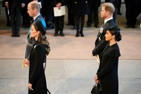 london, england   september 14 catherine, princess of wales, prince william, prince of wales, meghan, duchess of sussex and prince harry, duke of sussex pay their respects in the palace of westminster after the procession for the lying in state of queen elizabeth ii on september 14, 2022 in london, england queen elizabeth iis coffin is taken in procession on a gun carriage of the kings troop royal horse artillery from buckingham palace to westminster hall where she will lay in state until the early morning of her funeral queen elizabeth ii died at balmoral castle in scotland on september 8, 2022, and is succeeded by her eldest son, king charles iii  photo by christopher furlonggetty images
