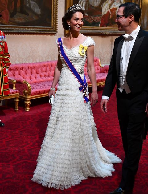 britains catherine, duchess of cambridge l walks with us secretary of treasury steven mnuchin as they arrive through the east gallery during a state banquet in the ballroom at buckingham palace in central london on june 3, 2019, on the first day of the us president and first ladys three day state visit to the uk   britain rolled out the red carpet for us president donald trump on june 3 as he arrived in britain for a state visit already overshadowed by his outspoken remarks on brexit photo by victoria jones  pool  afp        photo credit should read victoria jonesafp via getty images