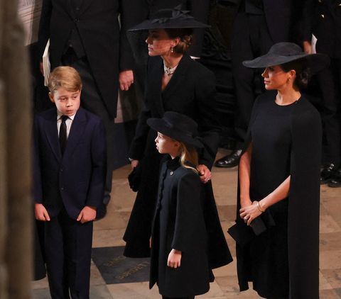 topshot of the britains prince george of wales, britains katharine, duchess of kent, britains princess charlotte of wales and meghan, duchess of sussex attend the state funeral and burial of queen elizabeth of britain, at westminster abbey in london, britain, 19 september 2022 photo by phil noblepool afp photo by phil noblepoolafp via getty images