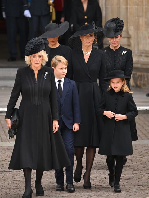 london, england   september 19 l r camilla, queen consort, meghan, duchess of sussex, prince george of wales, catherine, princess of wales, princess charlotte of wales and sophie, countess of wessex during the state funeral of queen elizabeth ii at westminster abbey on september 19, 2022 in london, england elizabeth alexandra mary windsor was born in bruton street, mayfair, london on 21 april 1926 she married prince philip in 1947 and ascended the throne of the united kingdom and commonwealth on 6 february 1952 after the death of her father, king george vi queen elizabeth ii died at balmoral castle in scotland on september 8, 2022, and is succeeded by her eldest son, king charles iii photo by karwai tangwireimage