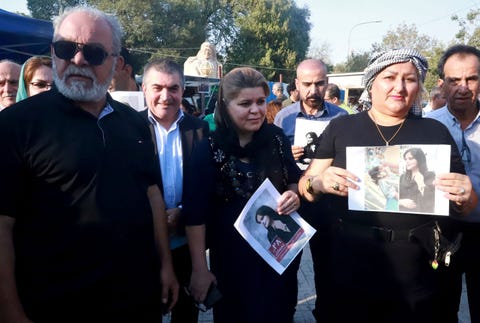 iraqi and iranian kurds, residing in northern iraq, march near a park in the iraqi kurdish city of sulaimaniya on september 19, 2022, against the death of mahsa amini, a woman in iran who died after being arrested by the islamic republics morality police amini, 22, was on a visit with her family to the iranian capital when she was detained on september 13 by the police unit responsible for enforcing irans strict dress code for women, including the wearing of the headscarf in public she was declared dead on september 16 by state television after having spent three days in a coma photo by shwan mohammed afp photo by shwan mohammedafp via getty images