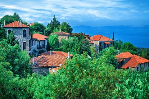 traditional houses at parthenon village parthenon is a nominated traditional settlement of the municipality of sithonia, 2nd food of chalkidiki, macedonia hellas greece located at an altitude of 320 m, looking toroneos gulfiit has 6 permanent residents but good tourist infrastructure
