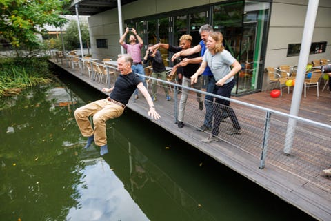 Svante Paabo Wins Nobel Prize For Neanderthal Genome Decoding leipzig, germany october 03 svante paabo, director of the max planck institute for evolutionary anthropology, is thrown into a pool of water by her colleagues after a press conference after he won the nobel prize in physiology or medicine on october 3, 2022 in leipzig, germany paabo is being recognized for his pioneering work in decoding the genome of neanderthals and proving a genetic link to modern humans photo by jens schluetergetty images