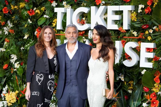 us actor george clooney c and his wife lebanese british barrister amal clooney r pose with us actress julia roberts on the red carpet upon arrival to attend the world premiere of the film ticket to paradise in central london on september 7, 2022 photo by niklas hallen  afp photo by niklas hallenafp via getty images