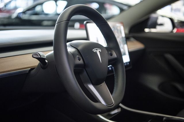 14 november 2018, north rhine westphalia, düsseldorf the logo can be seen on the steering wheel of tesla's model 3 electric car in a showroom tesla starts on 14112018 with the presentation of the car in europe photo christophe gateaudpa photo by christophe gateaupicture alliance via getty images