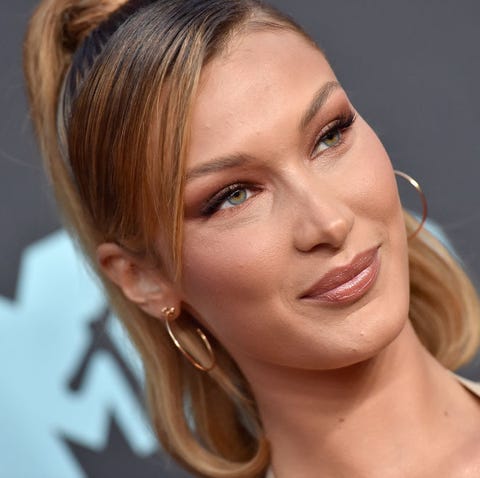 Bella Hadid Shows Off Platinum Blonde Hair In Tight Curls For New Fashion Shoot Bella Hadid Shows Off Platinum Blonde Hair In Tight Curls For New Fashion Shoot
