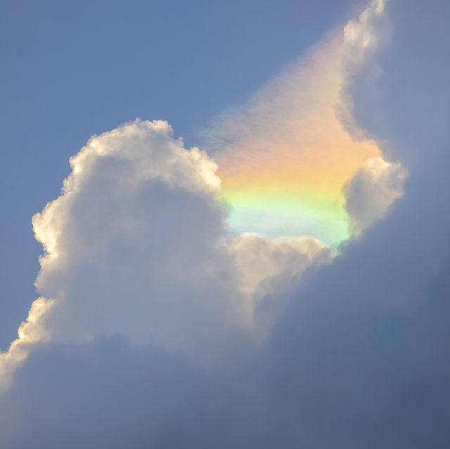 iridescent clouds formed between cumulus cloud in late afternoon in eastern side of singapore