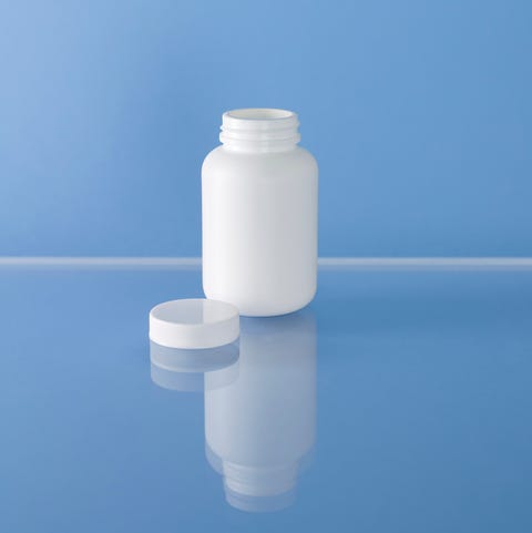 Opened bottle of pills white generic bottle of pills medicine the opened bottle stands on a shiny surface in front of a light blue background the bottle itself is of opaque white plasticif you like what youaave seen, check out these