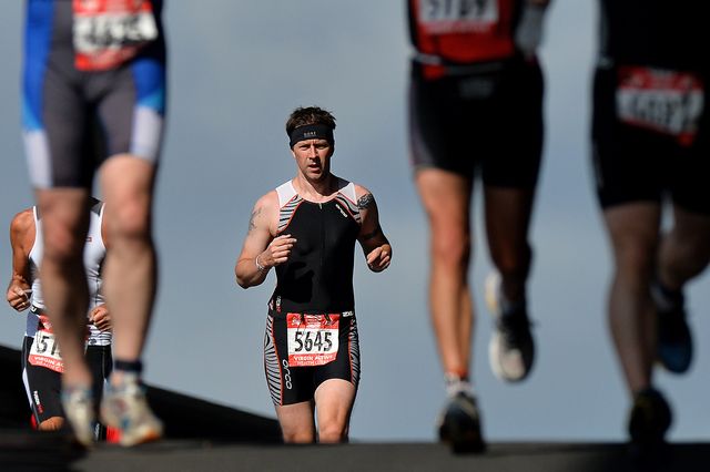 competitors are seen during the run phase of the london triathlon in east london on july 28, 2013   afp photo  ben stansall        photo credit should read ben stansallafp via getty images