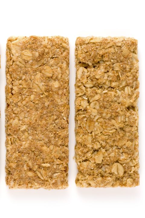 Crunchy oat granola bars isolated on a white background