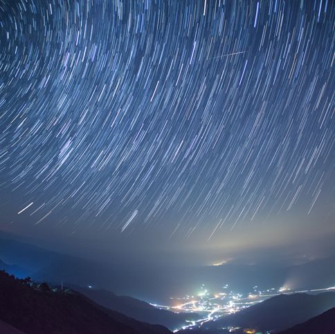 perseids meteor shower over okayama, japan  shooting star through the middle of the frame