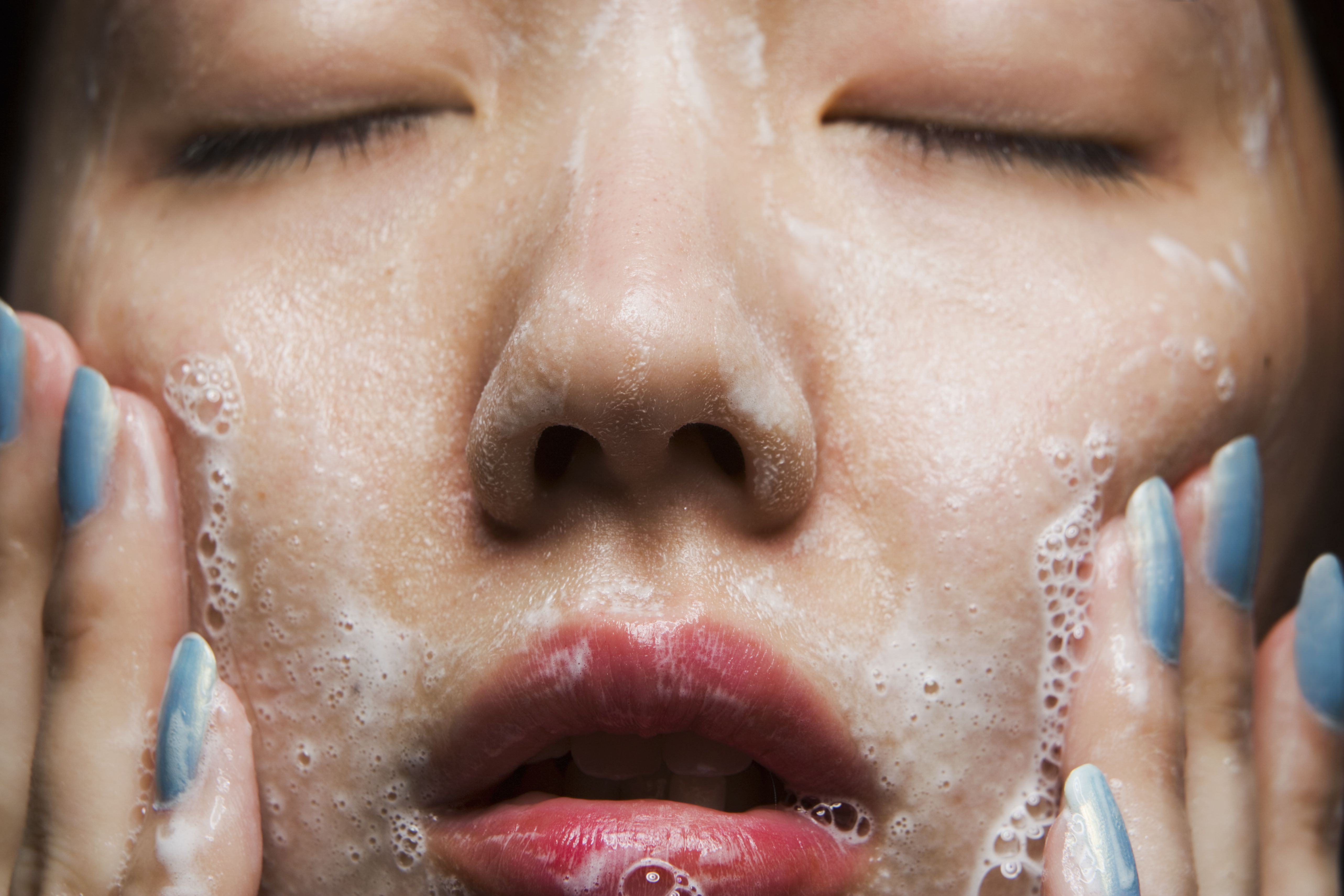 washing up brush with face