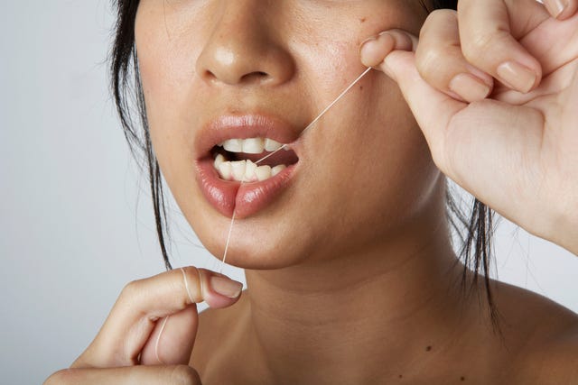 How To Use A Dental Floss Stick