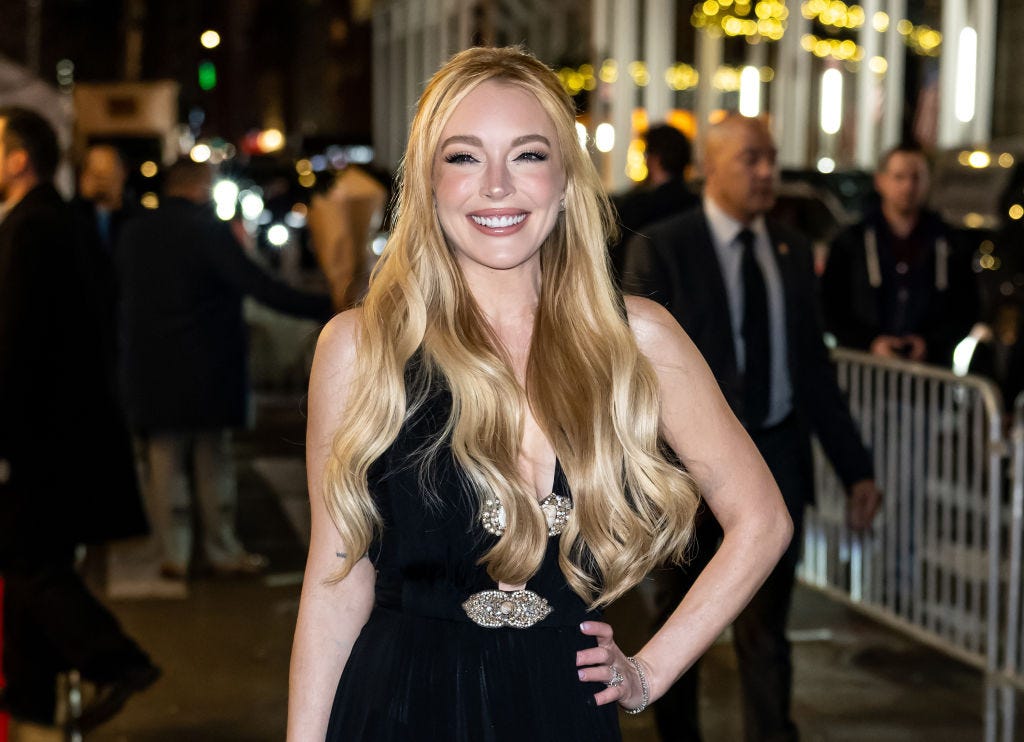 Lindsay Lohan Makes a Case for Wearing the Sheer Trend This Holiday Season