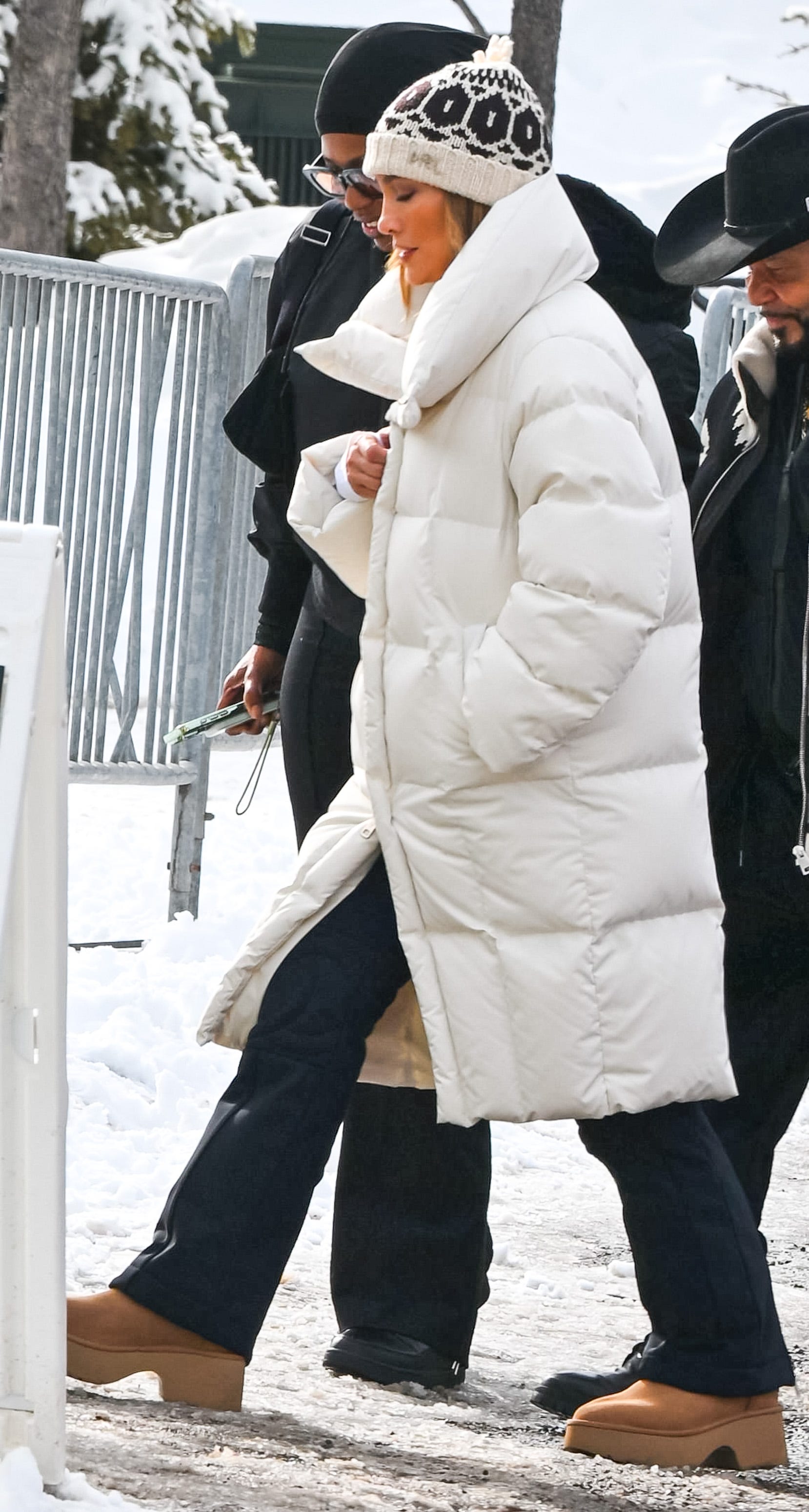 Jennifer Lopez Elevates Her Winter-White Puffer Coat with Heeled Uggs