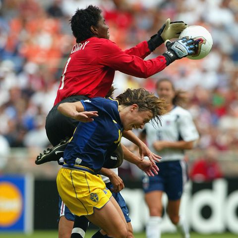 washington   september 21  goalie briana scurry 1 of usa catches the ball over hanna ljungberg 10 of sweden during the fifa womens world cup match at rfk memorial stadium on september 21, 2003 in washington, dc  the usa defeated sweden 3 1  photo by ben radfordgetty images