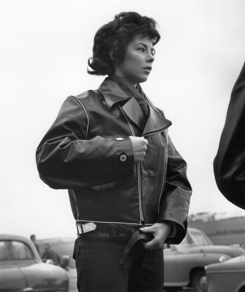 a young woman biker zipping up her leather jacket   photo by keystone featuresgetty images