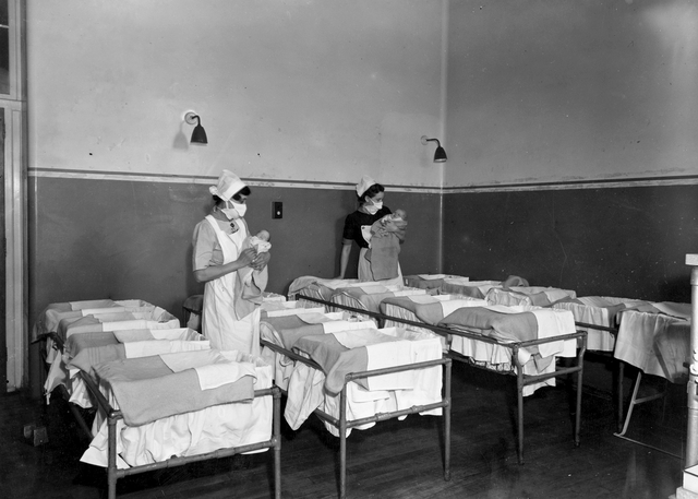 1st december 1947  nurses holding babies in a maternity ward at guy's hospital, london  photo by frank harrisontopical press agencygetty images