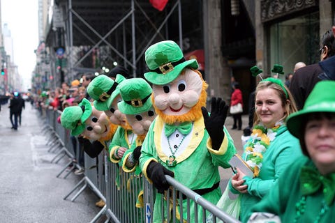 spectators watch marchers walking past during the st patricks day parade in new york on march 17, 2015 afp photojewel samad        photo credit should read jewel samadafp via getty images