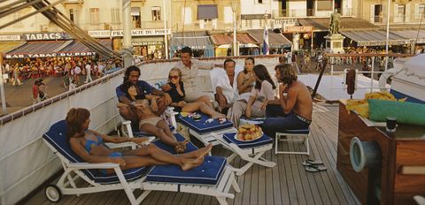 holidaymakers on the deck of yacht in saint tropez, france, august 1971 photo by slim aaronsgetty images
