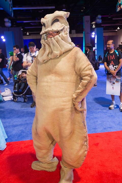 disney fan dressed as oogie boogie from the nightmare before christmas in a brow burlap suit