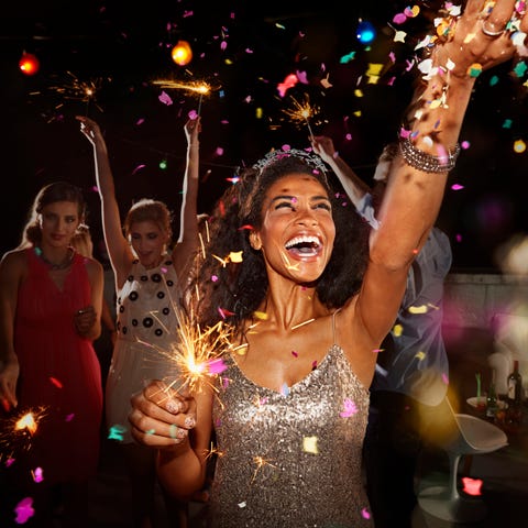 Friends celebrating at New Year's Eve party friends celebrating at new year