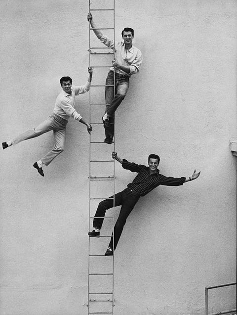 l to r tony curtis, rock hudson, and robert wagner, smiling, while posing on ladder together  photo by sharlandthe life images collection via getty imagesgetty images