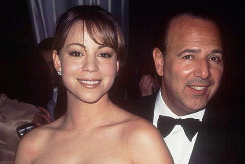 l r piosenkarka pop mariah carey obejmowana przez swojego męża sony music chief tommy mottola at unident event photo by marion curtisdmithe life picture collection via getty images