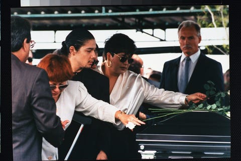 family of tejano singer selena who was killed by her former fan club pres yolanda saldivar mother marcela quintanilla 2l, husband chris perez 3l  sister suzette 2r laying roses atop casket at her funeral  photo by barbara laingthe life images collection via getty imagesgetty images