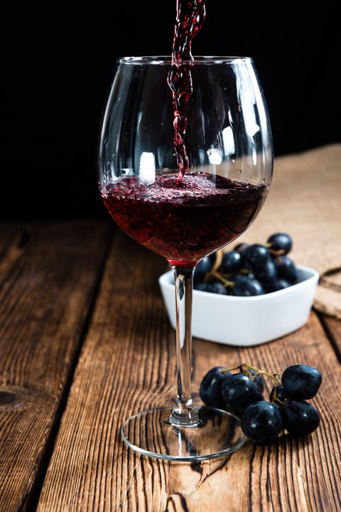 Red Wine (on wooden background)