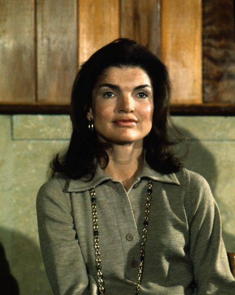 Jacqueline Kennedy Onassis Sitting at Table