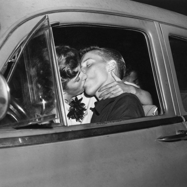 original caption 1954  dusk until dawn prom party estelle and brandon kissing in car