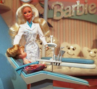 new york, ny february 10 a dentist barbie doll is displayed 10 february in new york during the first day of the international toy center annual fair some 40,000 buyers, sellers and analysts are gathering to view the latest toys photo credit should read jon levyafp via getty images