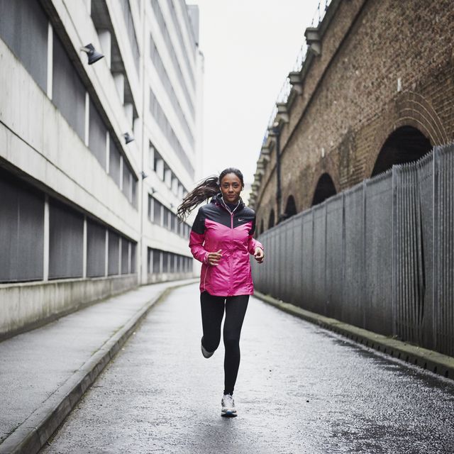 female runner in city