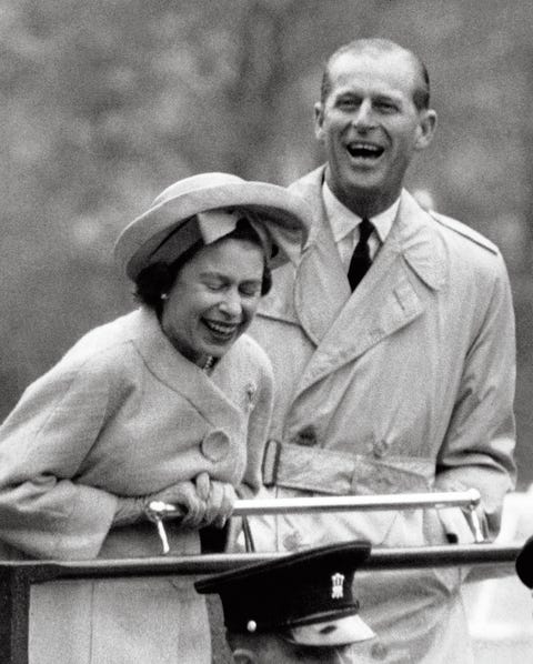 MAY 11, 1963 The Queen and Prince Philip share a moment of laughter. may 11, 1963
the queen and prince philip share a moment of laughter