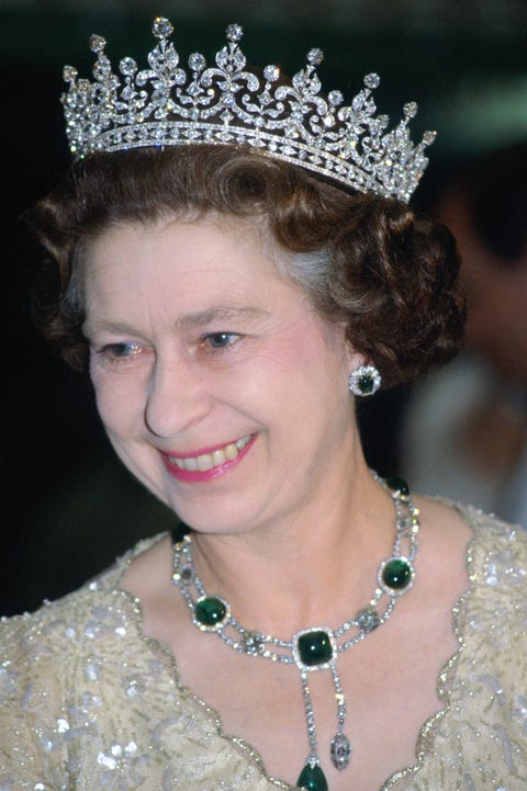 papua new guinea   october 13  queen elizabeth ii at a banquet in papua new guinea she is wearing the girls of great britain and ireland diamond tiara and an emerald necklace and earrings which are known as the cambridge and delhi durbar parure  photo by tim graham photo library via getty images