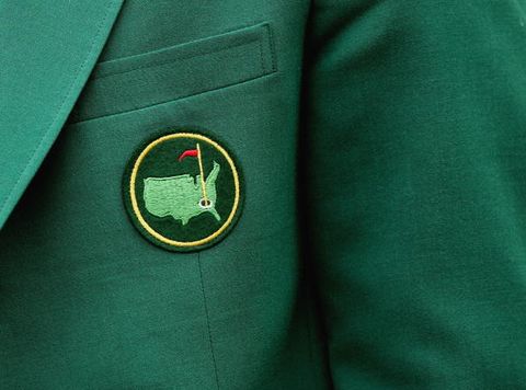 Green, Sleeve, Collar, Textile, Logo, Blazer, Teal, Button, Symbol, Emblem, 
