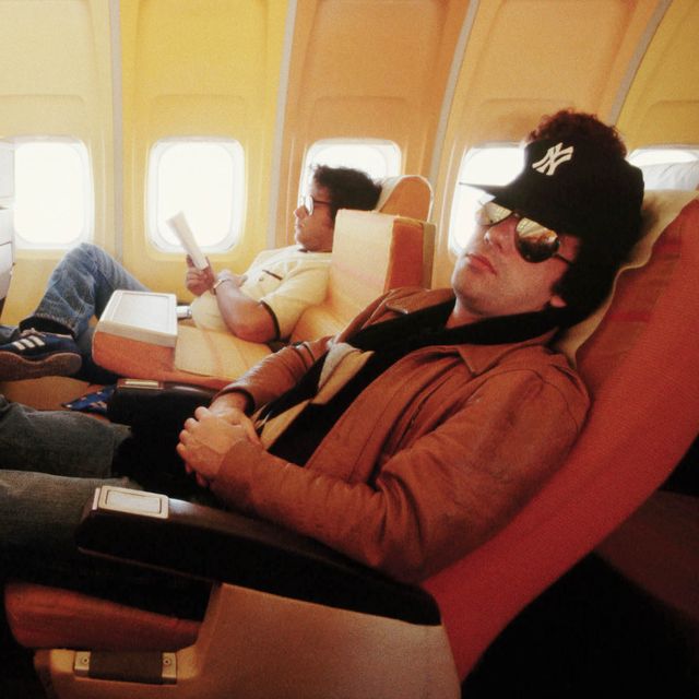 Billy Joel Resting in Airplane During Tour