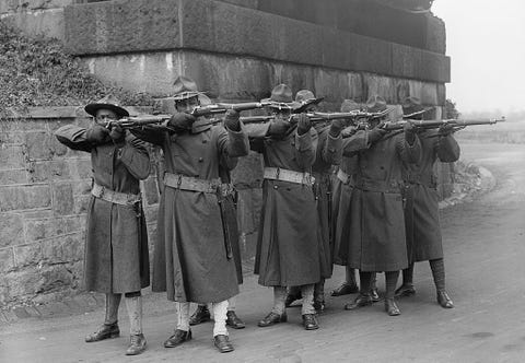 Photograph, Standing, Uniform, Soldier, Headgear, Stock photography, Photography, Military uniform, History, Monochrome, types of guns