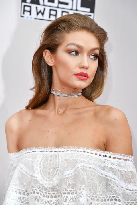 Gigi Hadid Walks Ama Red Carpet In White Roberto Cavalli Dress Image