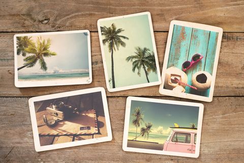 summer photo album on wood table instant photo of vintage camera   vintage and retro style