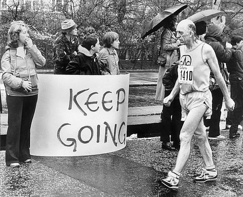 a competitor in the first ever london marathon, march 1981 george douthwaite at walking pace passing a sign saying keep going  photo by monte frescomirrorpixgetty images