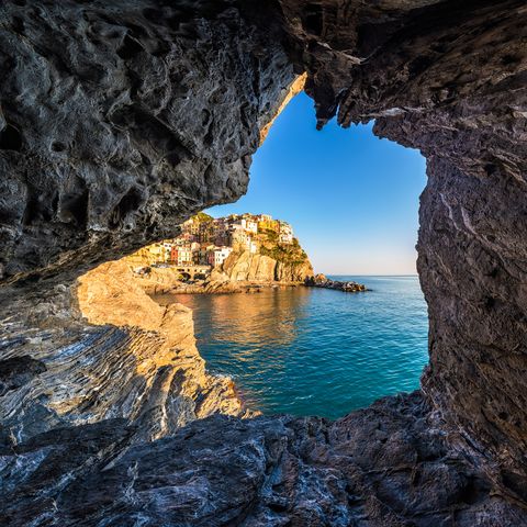Natural arch, Formation, Rock, Sea cave, Sea, Coastal and oceanic landforms, Water, Cave, Sky, Natural landscape, 