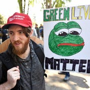 US-POLITICS-UNIVERSITY-BERKELEY andrew knight holds a sign of pepe the frog, a conservative icon, during a rally in berkeley, california on april 27, 2017
conservative firebrand ann coulter on april 26, 2017 canceled a planned appearance at the university of california, berkeley, saying she had lost the backing of the groups that had sponsored her talk the right wing commentator had insisted she would show up at berkeley, a famously progressive campus, on thursday even though the university said it could not provide a suitable venue because of security threats but coulter said she was forced to reconsider her decision after the conservative young americas foundation and the berkeley college republicans, which had sponsored her talk, backed out, accusing the university of creating a hostile atmosphere
afp photo josh edelson photo credit should read josh edelsonafp via getty images